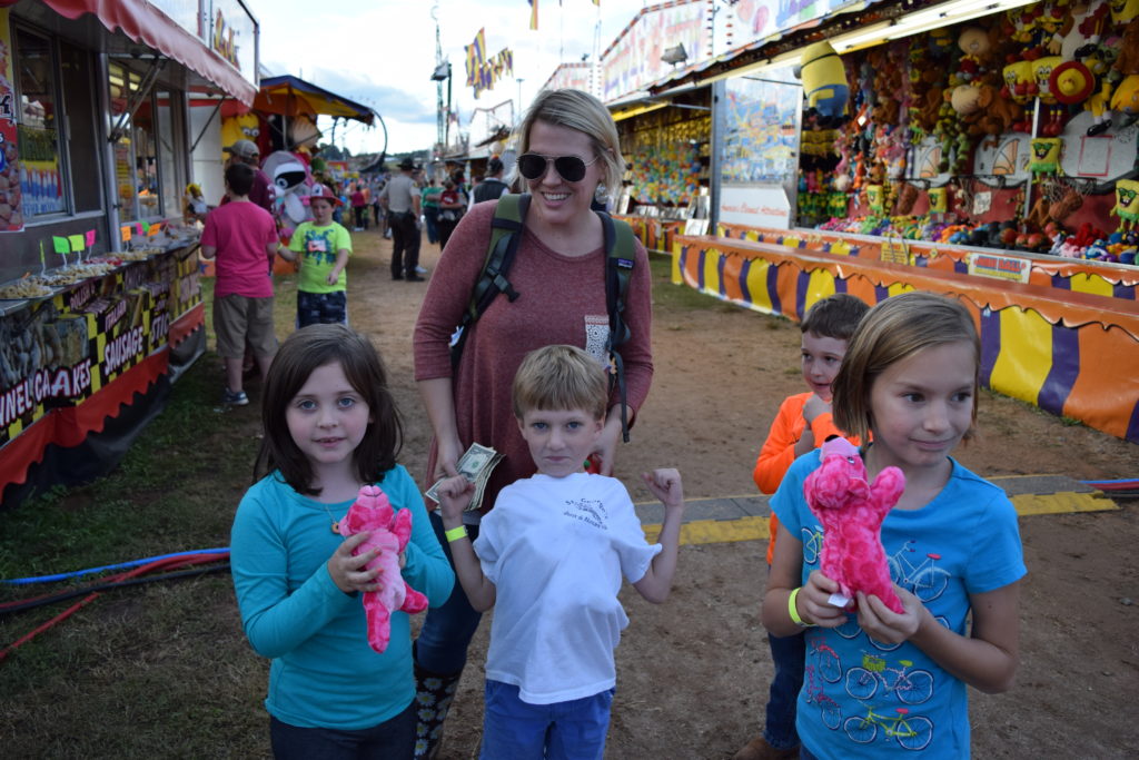 a family at the fair
